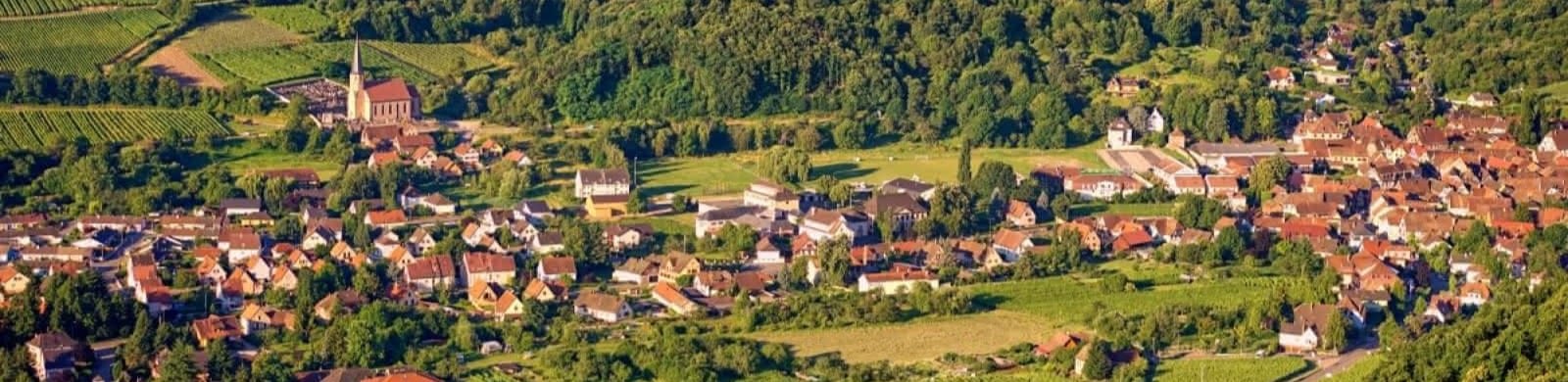 Chauffeur VTC à Andlau — Abbaye et Route des Vins Alsace VTC Andlau — Abbaye bénédictine et vignobles des grands crus alsaciens